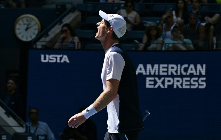 Murray slides to heavy US Open defeat against Dimitrov