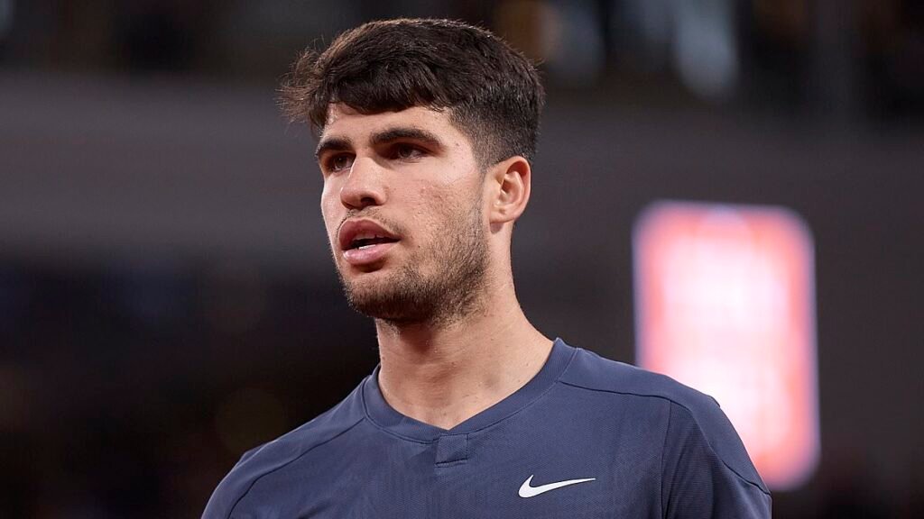Alcaraz overcomes injury to secure second-round win at French Open