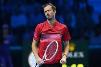 Daniil Medvedev loses his temper in bizarre fashion as he juggles with his racquet during straight sets defeat to Taylor Fritz in ATP Finals