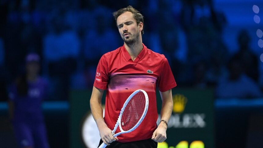 Daniil Medvedev loses his temper in bizarre fashion as he juggles with his racquet during straight sets defeat to Taylor Fritz in ATP Finals