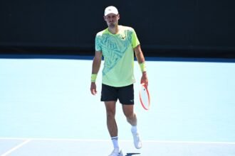 Bernard Tomic’s Australian Open comeback bid ends in disaster – and Lleyton Hewitt’s son also struggles