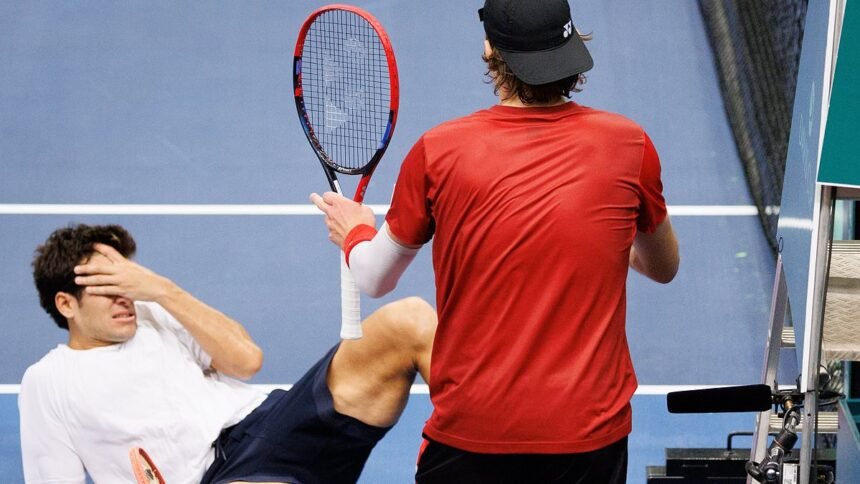 Davis Cup Belgium vs Chile: Tennis world in uproar as star slams his shoulder into his opponent’s FACE – and you’ll never guess who got disqualified for it